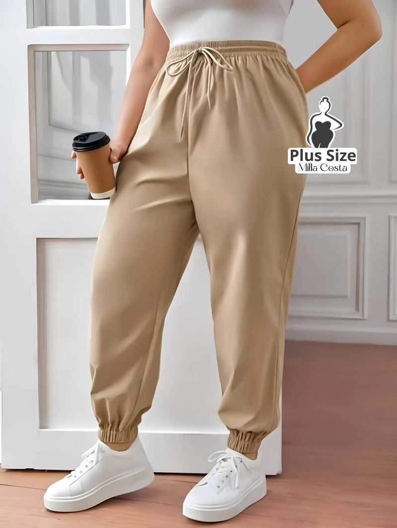 Calça Jogger com Amarração Plus Size - Tabela de Medidas na Descrição