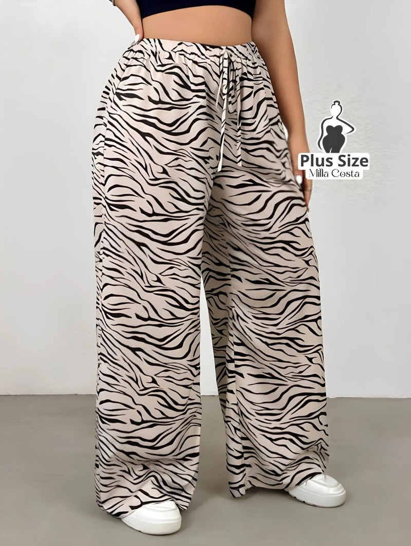 Calça Pantalona Estampada com Cintura de Amarração Plus Size - Tabela de Medidas na Descrição