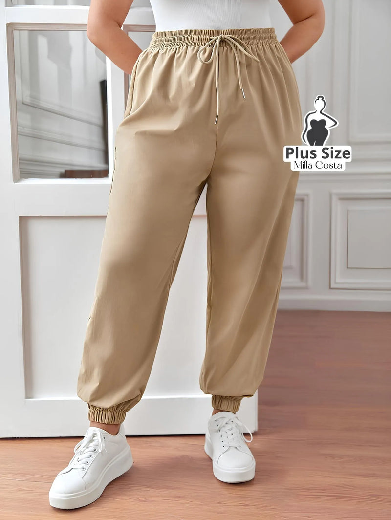 Calça Jogger com Amarração Plus Size - Tabela de Medidas na Descrição