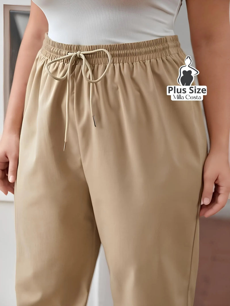 Calça Jogger com Amarração Plus Size - Tabela de Medidas na Descrição